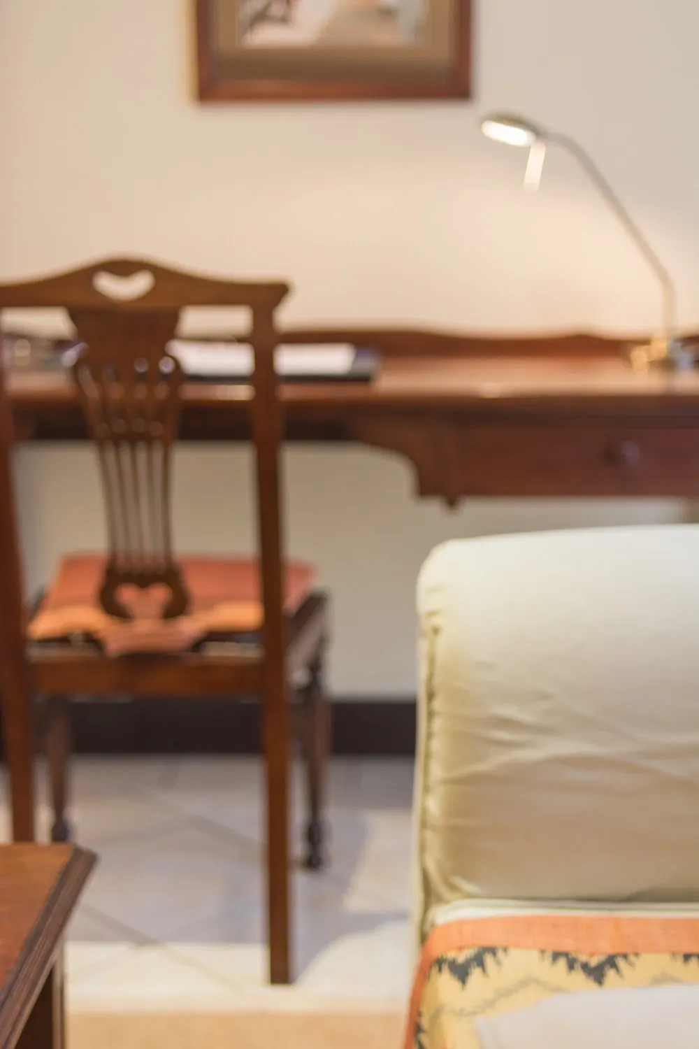 Upholstered seating and furniture detail — Heron Portico Hotel