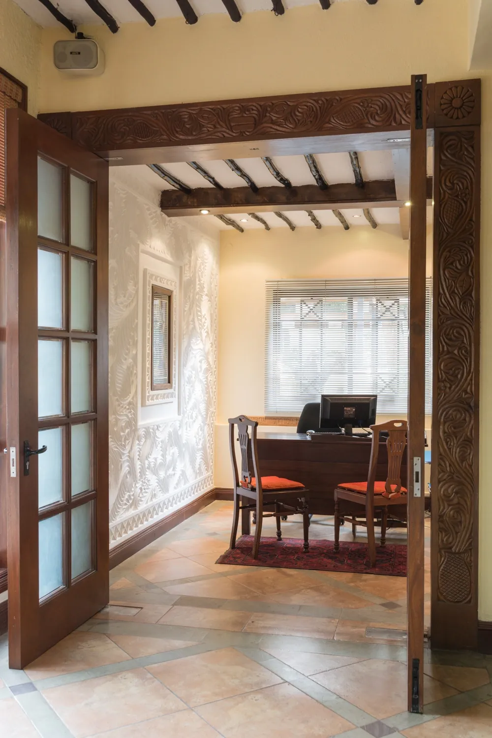 Interior doorway with decorative plasterwork — Heron Portico Hotel