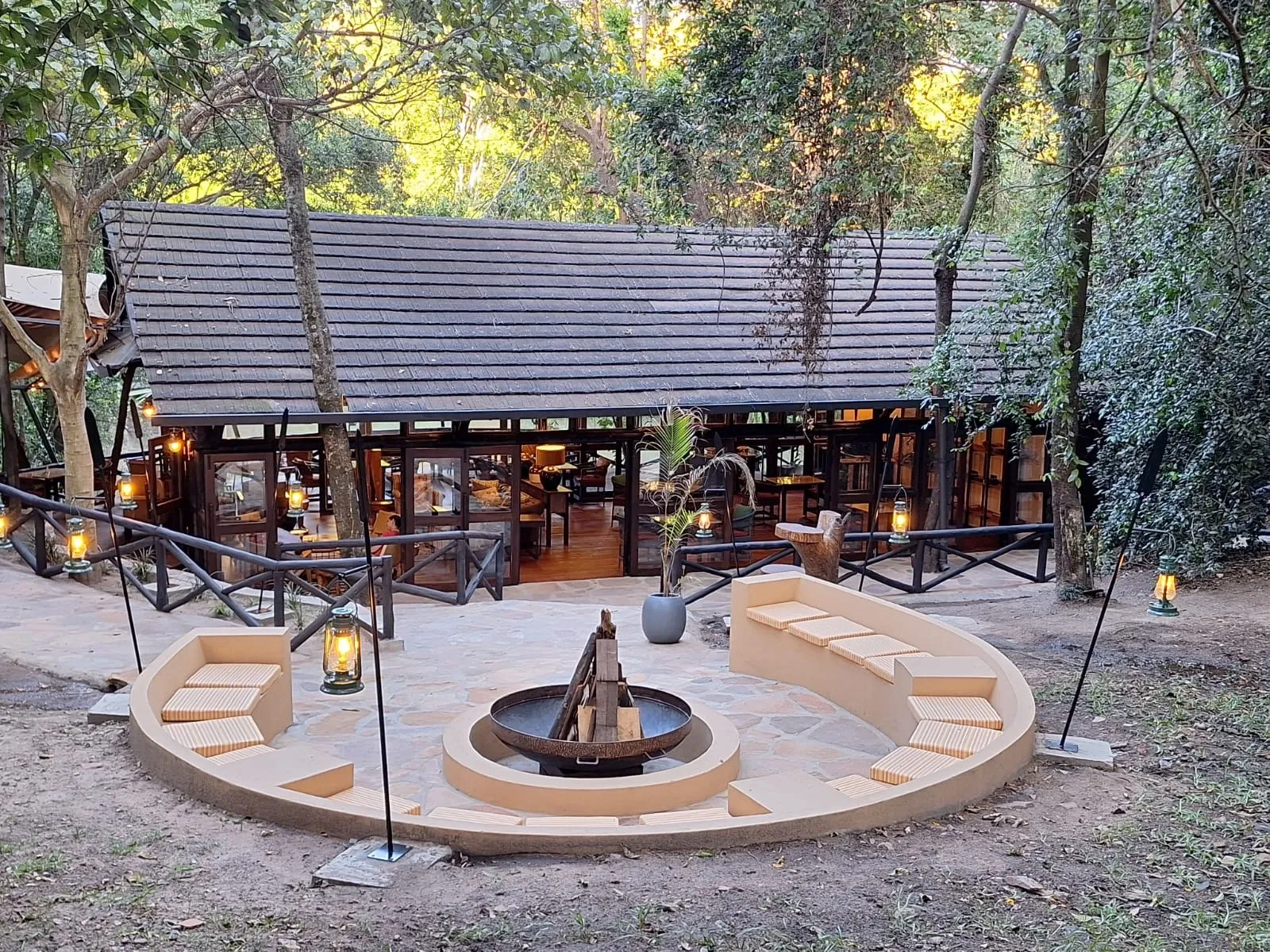 Outdoor seating around a firepit — Sarova Mara — Olchani