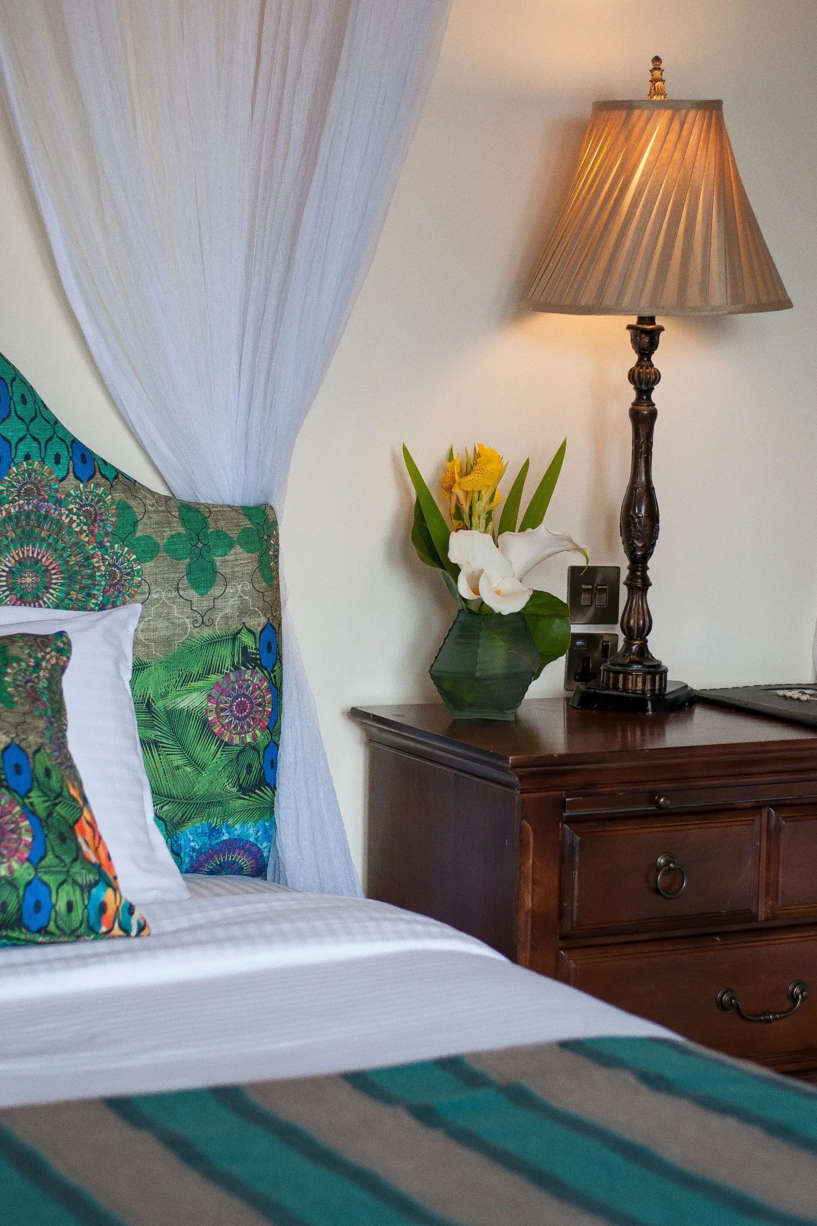 Bedside lamp and upholstered headboard — The Bishops House