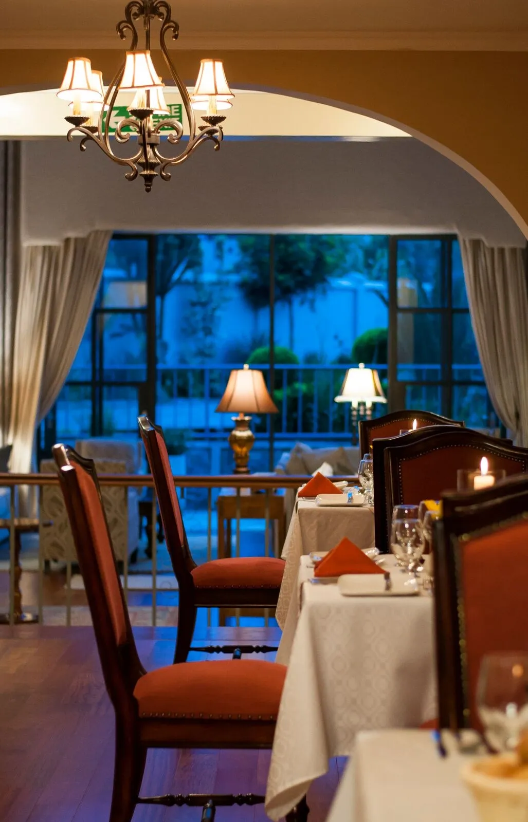 Dining interior framed by an archway — The Bishops House