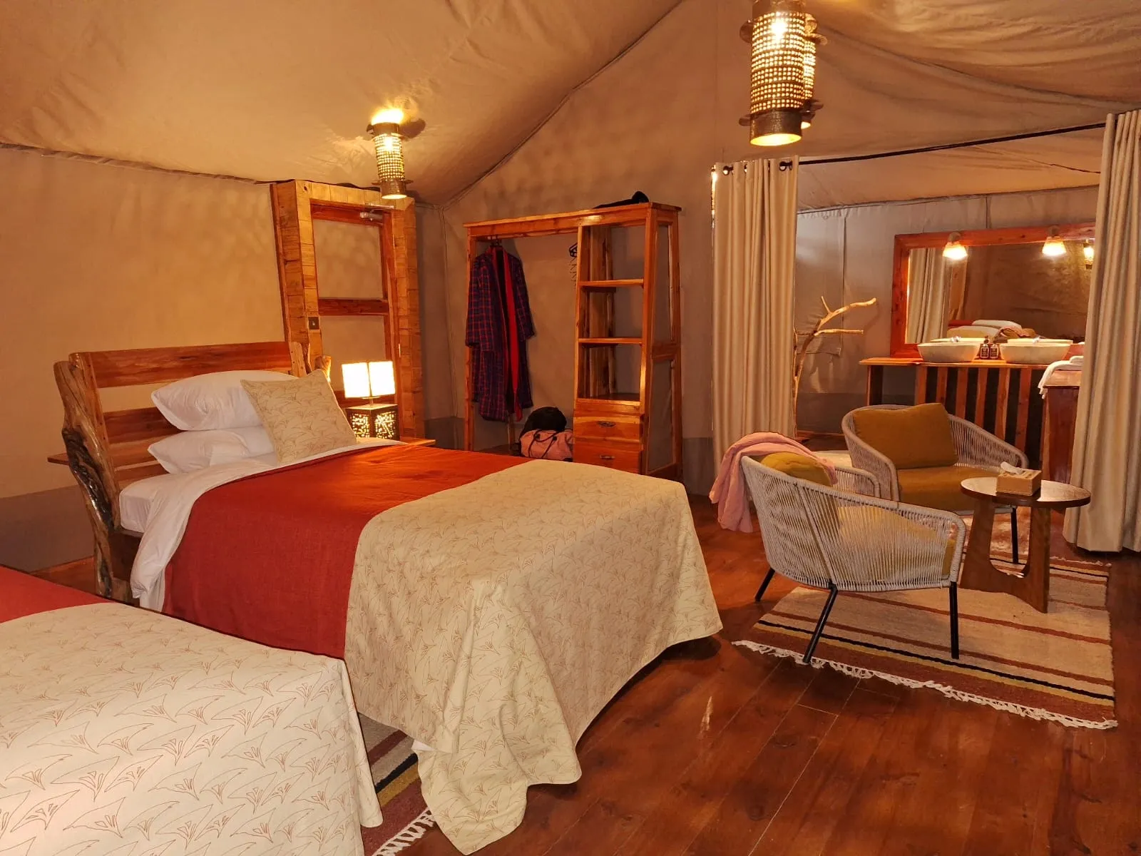 Twin beds inside a guest tent — Mara Siana Tented Camp
