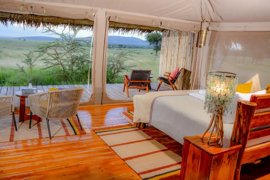 Guest bedroom opening toward the landscape — Mara Siana Tented Camp