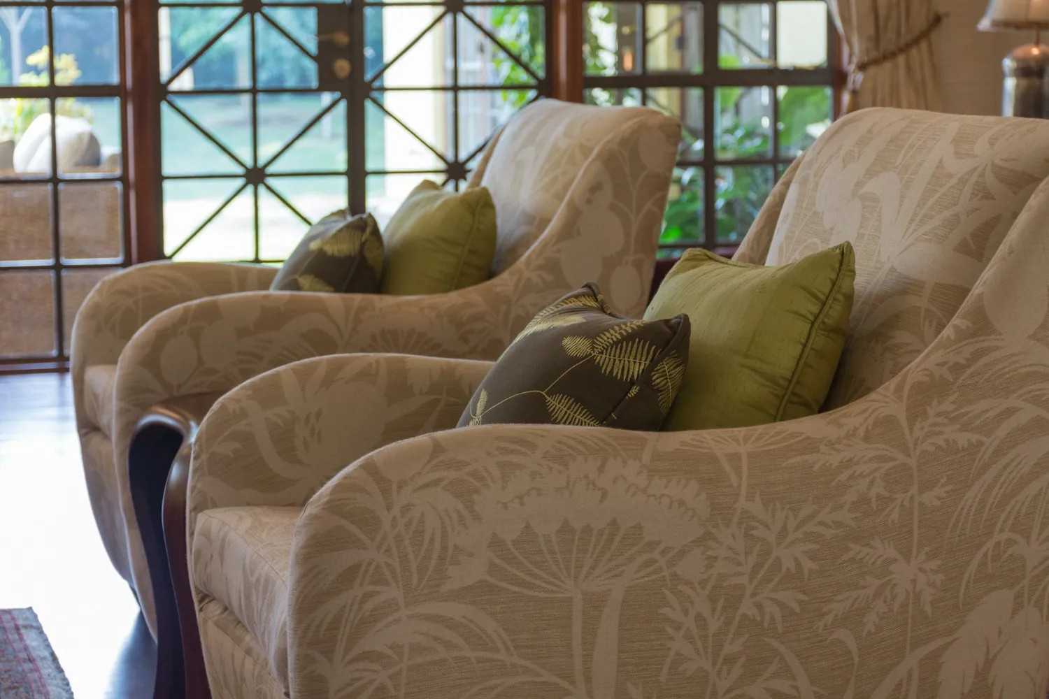 Upholstered chairs and material detail — Mbogani