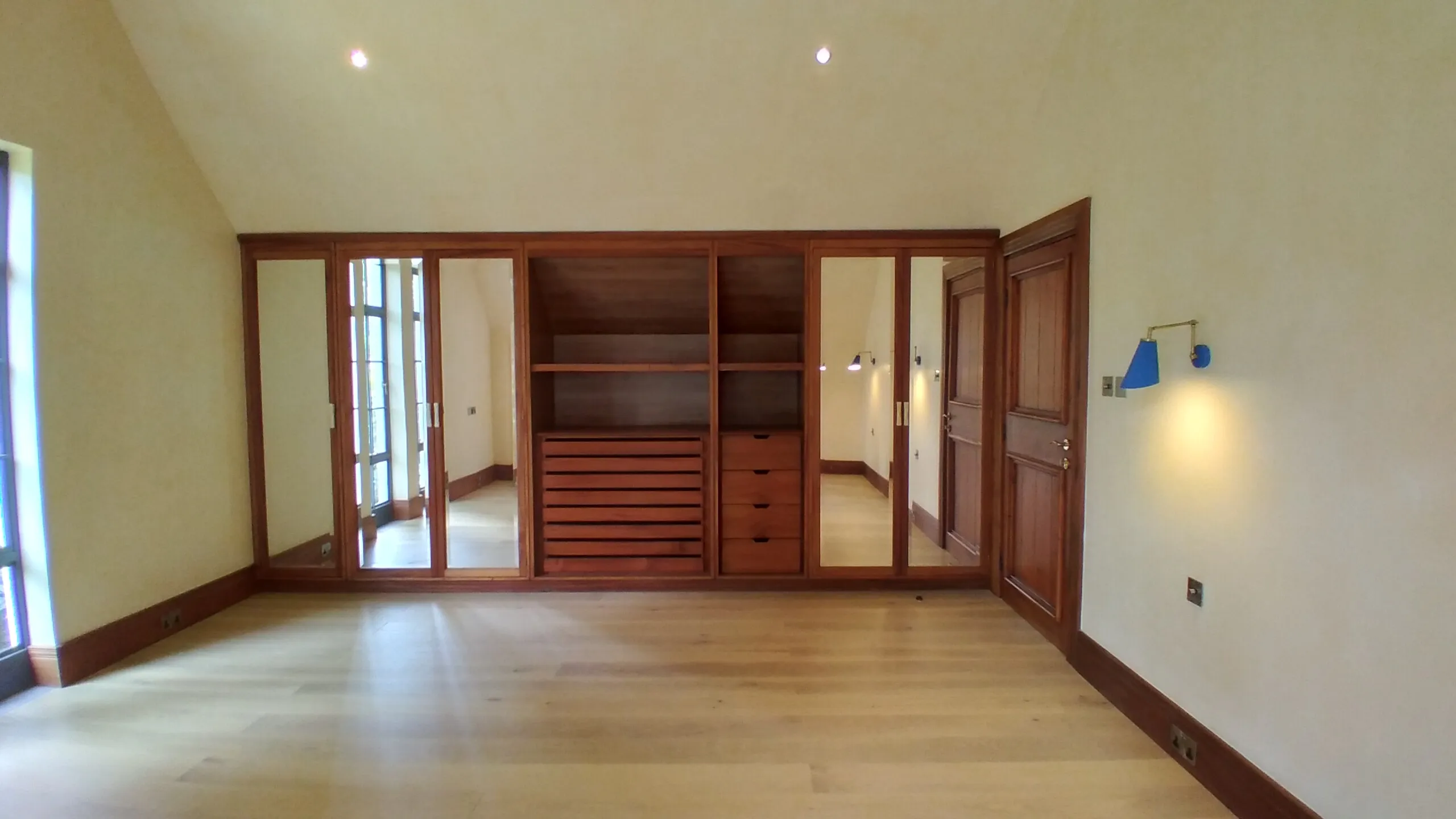Room with fitted wardrobes — Karura Avenue